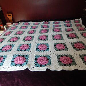 Brand new crocheted rose afghan